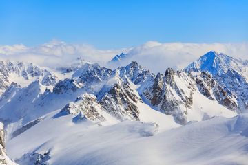 Snowy Mountain Photo by Denis Linine on Unsplash